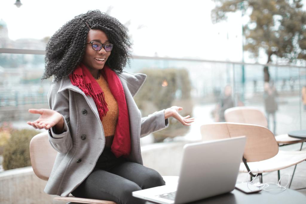 Image: A person engaging in mindfulness meditation, surrounded by elements representing holistic well-being and balance.
